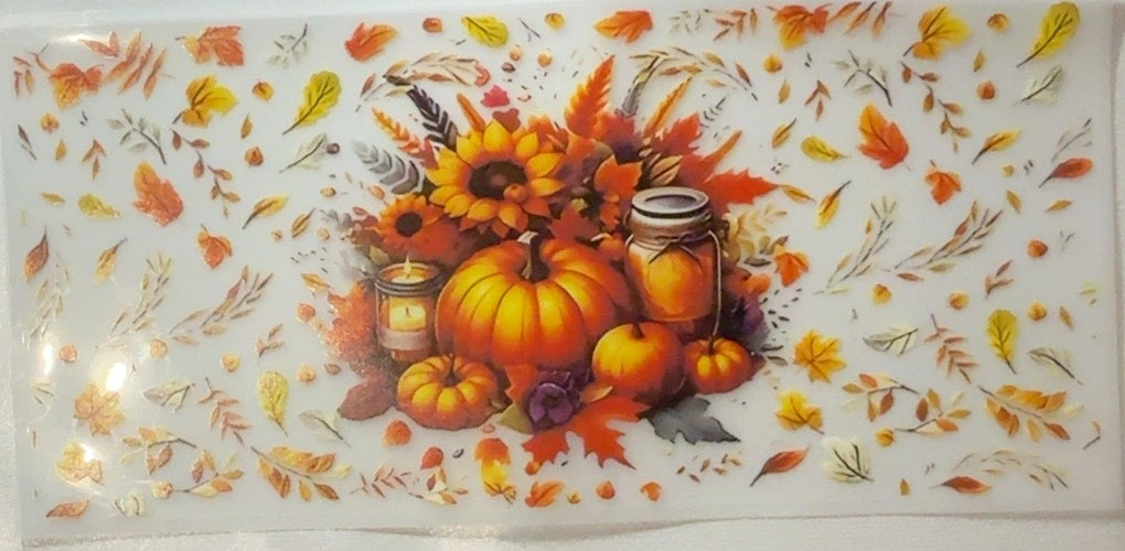 Fall tumbler wrap with pumpkins sunflowers mason jar candle and autumn leaves