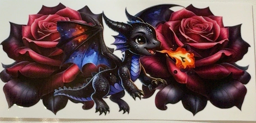 Black baby dragon breathing fire between red roses fantasy tumbler wrap