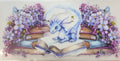 Blue dragon on open book with purple flowers fantasy tumbler wrap